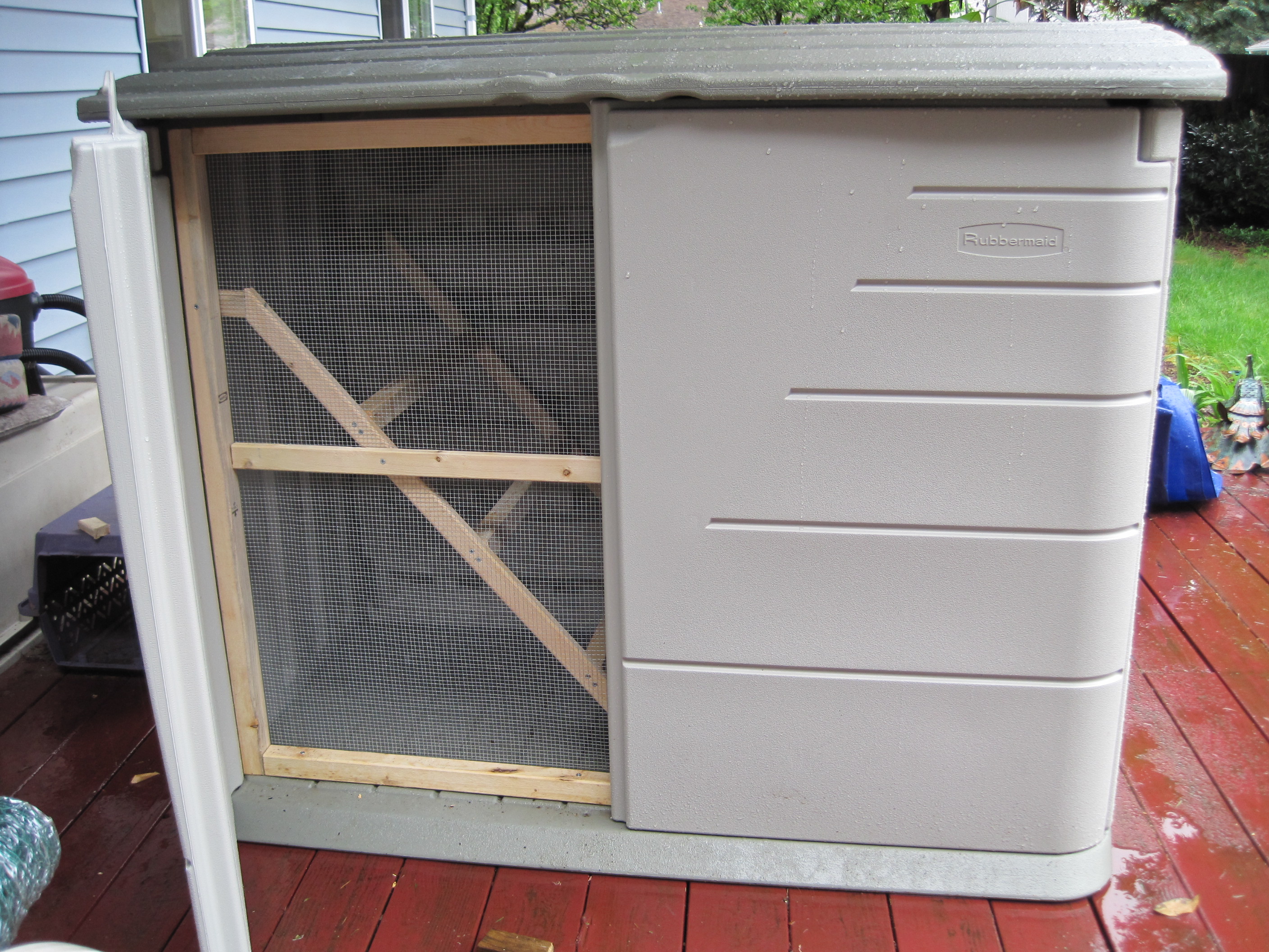 Inside, I added a roost and a rack to hold the “nestbuckets” made 